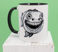 Freddy The Toothy Fish Black Handle Mug