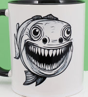 Freddy The Toothy Fish Black Handle Mug