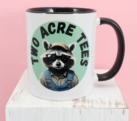 TwoAcreTees.com Jasper The Two Acre Tees Raccoon Logo Black Handle Mug